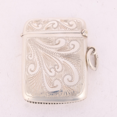 230 - An Edwardian silver Vesta case, Arthur Barnett & Co Ltd, Birmingham 1907, rectangular form with engr... 