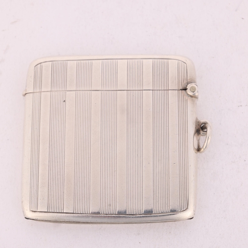 234 - An Art Deco George V silver Vesta case, Horace Woodward & Co Ltd, Birmingham 1914, square form with ... 