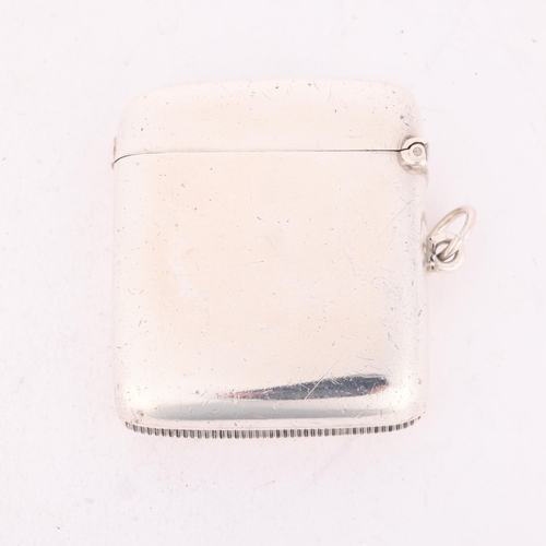 244 - An Edwardian Britannia Standard silver Vesta case, Saunders & Shepherd, London 1902, plain rectangul... 