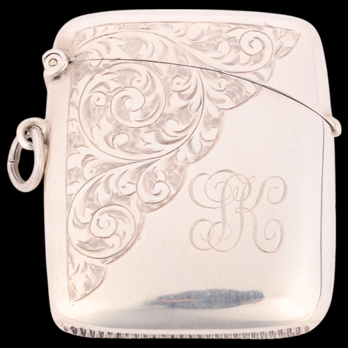 248 - An Edwardian silver Vesta case, Charles S Green & Co, Birmingham 1908, curved rectangular form with ... 