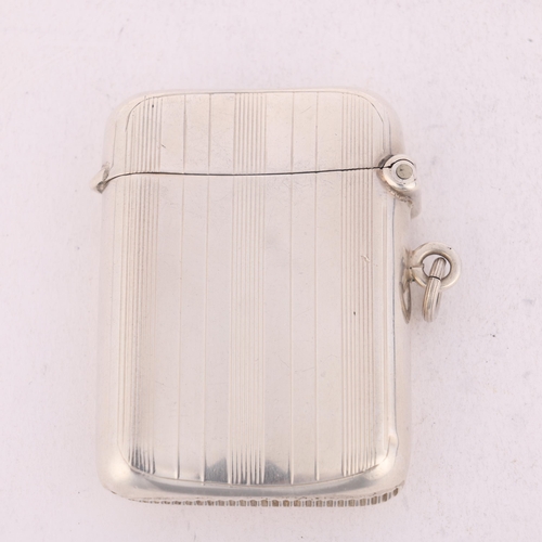 250 - A George V silver Vesta case, Clark & Sewell, Chester 1919, curved rectangular form with allover eng... 