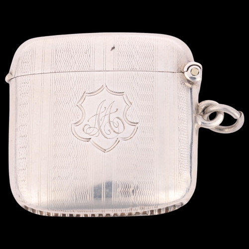 253 - An Edwardian silver Vesta case, Joseph Gloster Ltd, Birmingham 1902, curved square form with allover... 