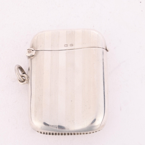 255 - A George V silver Vesta case, Joseph Gloster Ltd, Birmingham 1919, curved rectangular form with allo... 