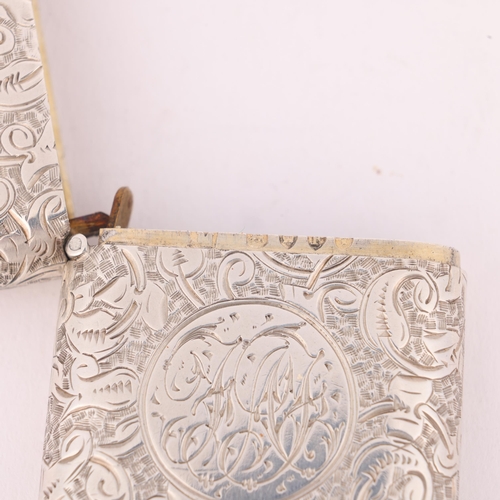 26 - SAMPSON MORDAN & CO - a Victorian silver Vesta case, London 1881, rounded rectangular form with allo... 