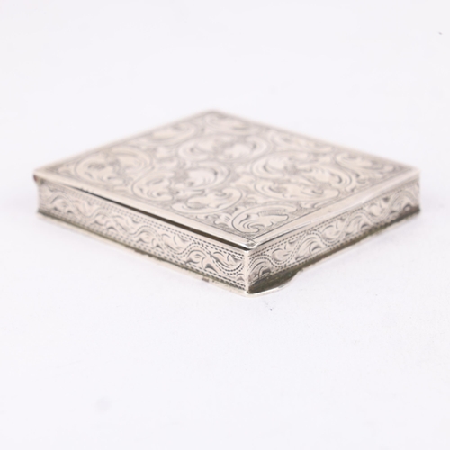 265 - A Continental silver powder compact, rectangular form with allover engraved foliate decoration and b... 