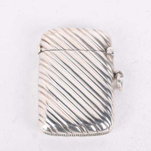 266 - A late Victorian silver Vesta case, William Neale, Chester 1895, rectangular form with allover flute... 