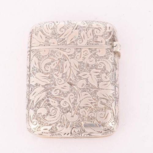 27 - SAMPSON MORDAN & CO - a late Victorian silver Vesta case, London 1896, rounded rectangular form with... 