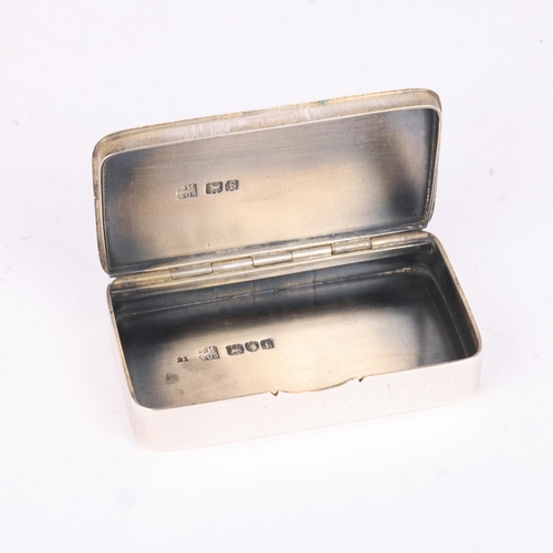 29 - SAMPSON MORDAN & CO - an Edwardian silver Vesta case, London 1901, rectangular form with hinged cove... 