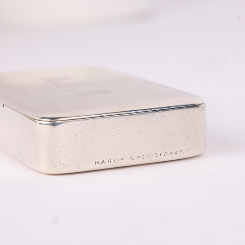 29 - SAMPSON MORDAN & CO - an Edwardian silver Vesta case, London 1901, rectangular form with hinged cove... 