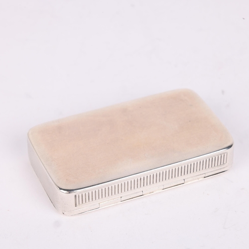 29 - SAMPSON MORDAN & CO - an Edwardian silver Vesta case, London 1901, rectangular form with hinged cove... 