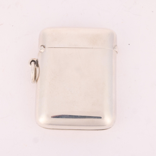 34 - SAMPSON MORDAN & CO - an Edwardian silver 'Seamless' Vesta case, London 1902, rectangular form with ... 