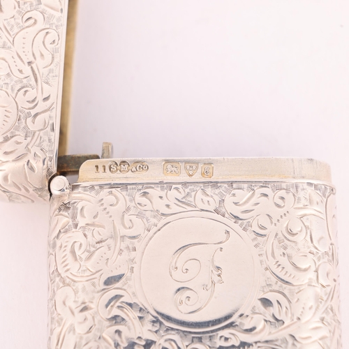 38 - SAMPSON MORDAN & CO - an Edwardian silver 'Seamless - Nonchoke' Vesta case, Chester 1905, rounded re... 