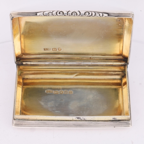 41 - NATHANIEL MILLS - a Victorian silver snuff box, Birmingham 1845, rectangular form with engine turned... 