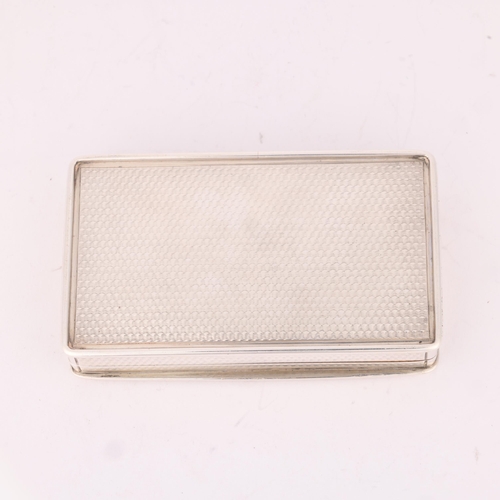 42 - NATHANIEL MILLS - a William IV silver snuff box, Birmingham 1835, rectangular form with raised edges... 