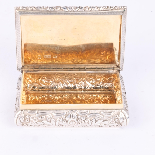 43 - NATHANIEL MILLS - a William IV silver snuff box, Birmingham 1836, rectangular form with bulbous body... 