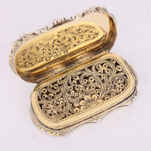 46 - NATHANIEL MILLS - an early Victorian silver-gilt vinaigrette, Birmingham 1846, shaped rectangular fo... 