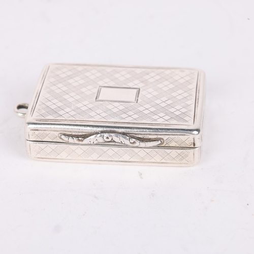 48 - NATHANIEL MILLS - a George IV silver vinaigrette, Birmingham 1827, rectangular form with allover lat... 