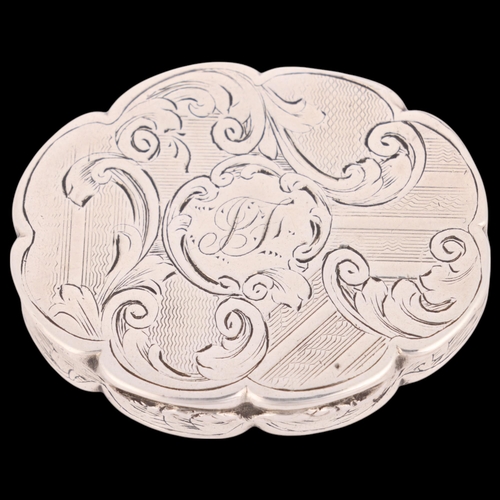 51 - NATHANIEL MILLS - an early Victorian silver vinaigrette, Birmingham 1843, shaped oval form with allo... 