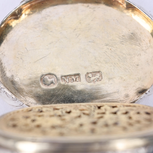 51 - NATHANIEL MILLS - an early Victorian silver vinaigrette, Birmingham 1843, shaped oval form with allo... 