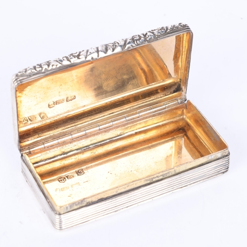 52 - A George III silver snuff box, Edward Smith, Birmingham 1828, rectangular form with relief cast flor... 