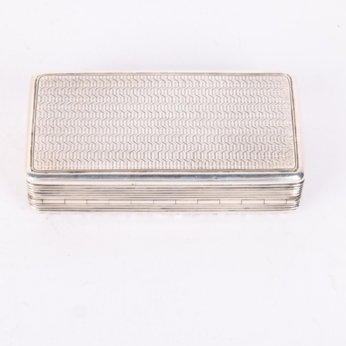 52 - A George III silver snuff box, Edward Smith, Birmingham 1828, rectangular form with relief cast flor... 