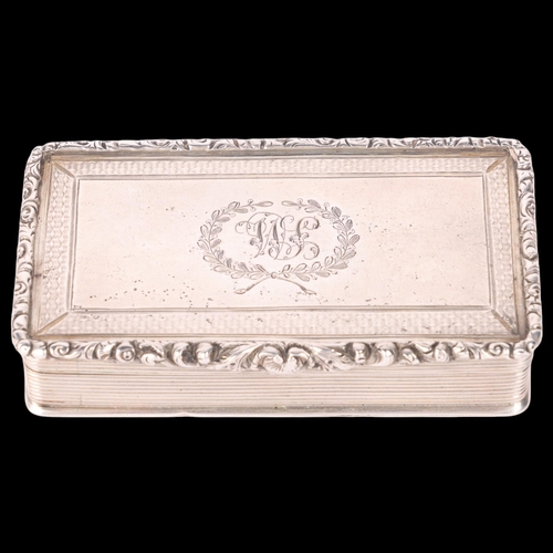 53 - A William IV silver snuff box, Edward Smith, Birmingham 1838, rectangular form with raised cast flor... 