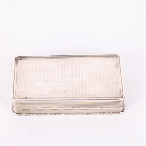 53 - A William IV silver snuff box, Edward Smith, Birmingham 1838, rectangular form with raised cast flor... 