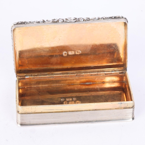 53 - A William IV silver snuff box, Edward Smith, Birmingham 1838, rectangular form with raised cast flor... 