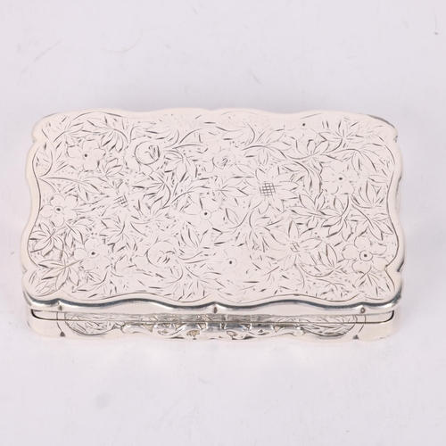 54 - A Victorian silver snuff box, George Unite, Birmingham 1888, shaped rectangular form with allover ch... 