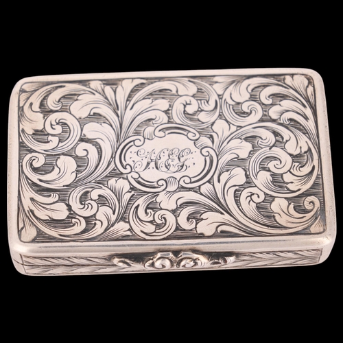 60 - A Victorian silver vinaigrette, Taylor & Perry, Birmingham 1840, rectangular form with allover chase... 