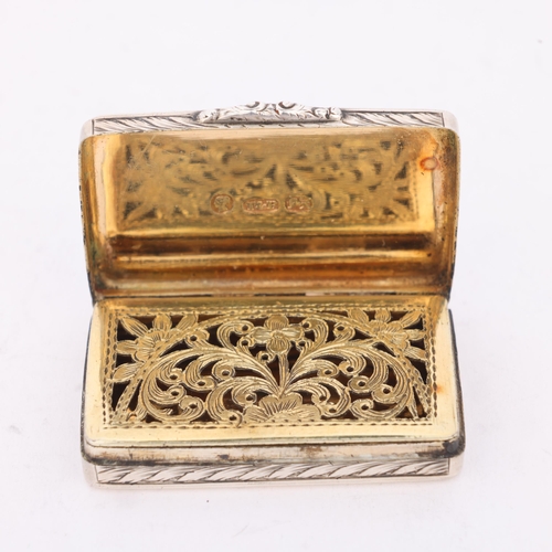 60 - A Victorian silver vinaigrette, Taylor & Perry, Birmingham 1840, rectangular form with allover chase... 