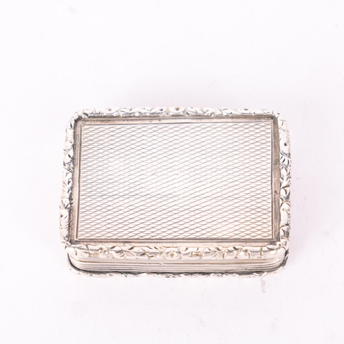 61 - A William IV silver vinaigrette, maker TS, Birmingham 1834, rectangular form with cast floral border... 