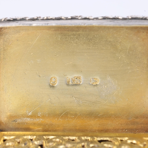 61 - A William IV silver vinaigrette, maker TS, Birmingham 1834, rectangular form with cast floral border... 