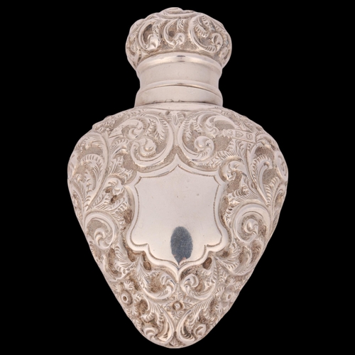 72 - A late Victorian silver 'Heart' scent bottle, George Watts & Co, Chester 1897, allover relief emboss... 