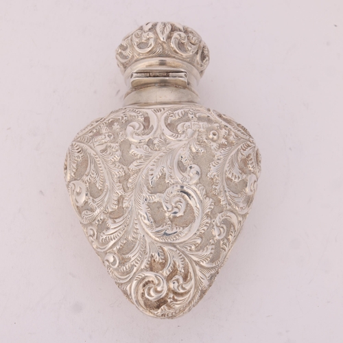 72 - A late Victorian silver 'Heart' scent bottle, George Watts & Co, Chester 1897, allover relief emboss... 