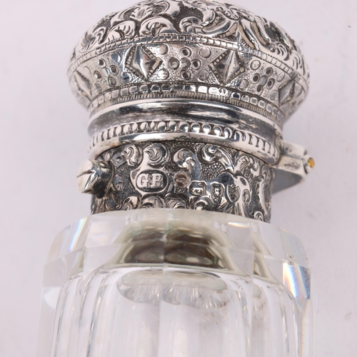 75 - A Victorian silver-mounted glass double-ended scent bottle, George Brace, London 1885, the faceted g... 