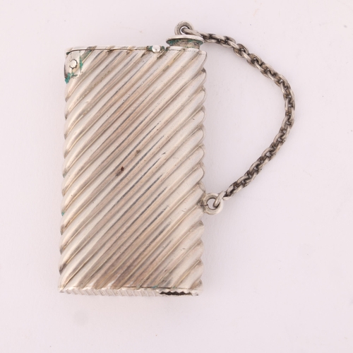 8 - SAMPSON MORDAN & CO - a Victorian silver Vesta case, London 1890, rectangular oval section form with... 