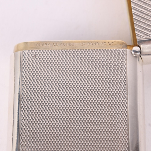 96 - A George V silver Vesta case, Alfred Clark, London 1921, rounded rectangular form with allover engin... 