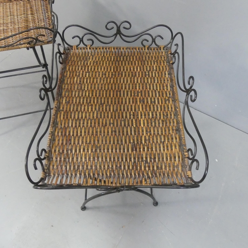 2139 - A pair of wrought iron tray tables with rattan panels and folding base. Width 59cm, height 65cm, dep... 