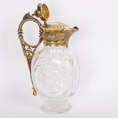 11 - A fine quality 19th century Claret jug, cut-glass and gilt-bronze with hinged lid, height 28cm