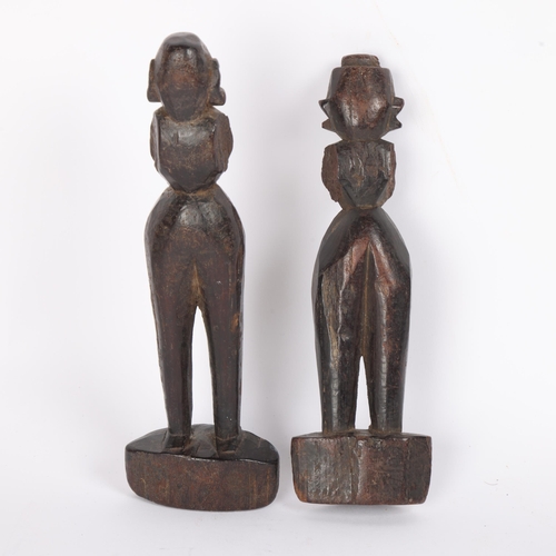 18 - 2 similar 19th century Indian carved wood dolls, largest height 20cm