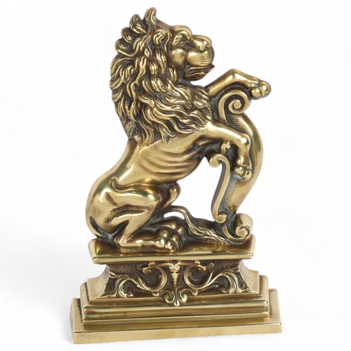 20 - A 19th century polished brass heraldic lion design doorstop, height 32cm