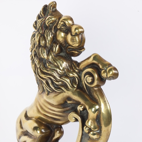 20 - A 19th century polished brass heraldic lion design doorstop, height 32cm