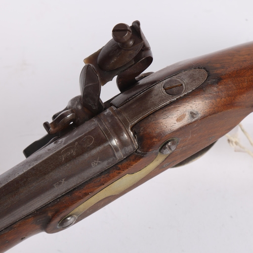 24 - A flintlock coach pistol circa 1820, by John & William Calvert of Leeds, barrel length 20.5cm, overa... 