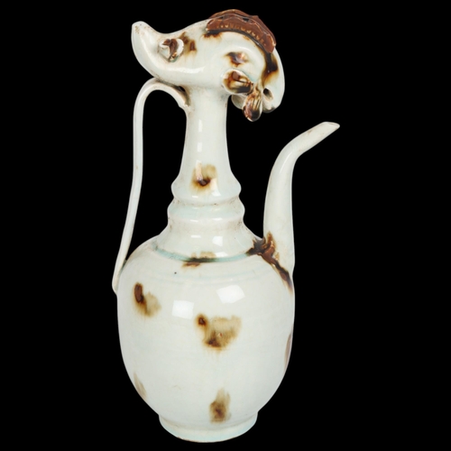 249 - An unusual Chinese glazed pottery ewer, height 31cm