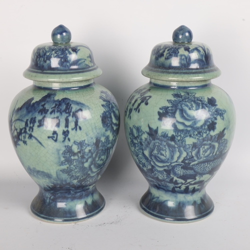 250 - A pair of Chinese blue and white porcelain jars and covers, height 35cm