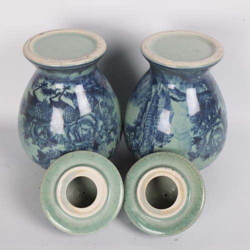 250 - A pair of Chinese blue and white porcelain jars and covers, height 35cm