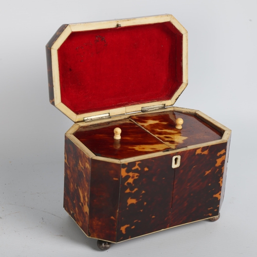 252 - An early 19th century tortoiseshell and silver inlaid tea caddy, with silver crest inset to the lid,... 