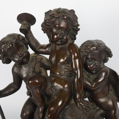 256 - 19th century patinated bronze sculpture of 3 cherubs cavorting over a barrel, unsigned on Carrera ma... 