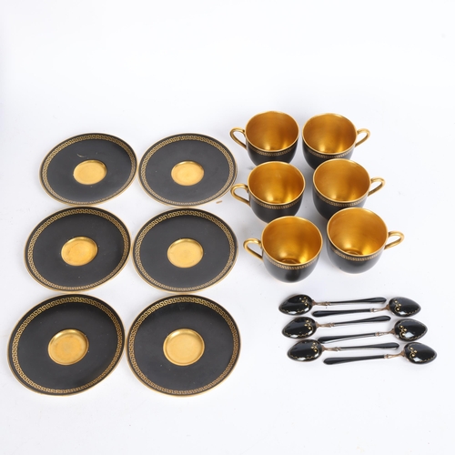 34 - A Royal Worcester black and gold Greek Key design porcelain coffee service, with matching silver bla... 